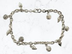 A Kit Heath Scottish silver charm bracelet, length 18cm.