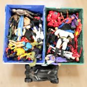 A collection of modern toys and action figures including Batman, Star Wars, Marvel, etc.