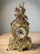 An ornate gilt brass quartz timepiece, height 38 cm.