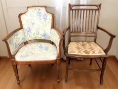 A late Victorian inlaid mahogany armchair and a further walnut chair in floral fabric.