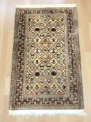 An Iranian rug, 130 cm x 80 cm.