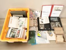 A collection of stamps, postcards, including antiquarian examples.