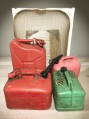 A group of jerry cans, two radiators, a mesh spark guard, etc.