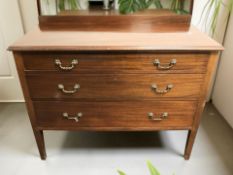 An Edwardian mahogany three drawer dressing chest, 107 cm x 49 cm x 87 cm.