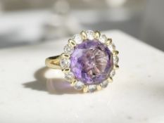A silver gilt amethyst dress ring, 6.7ct, size Q, with AIG certificate.