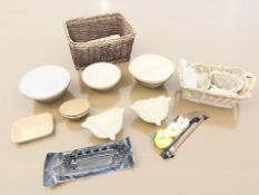 Two wicker baskets, stoneware jelly moulds, a T.G.