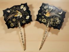 A pair of Victorian Aesthetic period papier maché and gilt wood face screens,