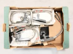 A group of chrome bathroom mixer taps.