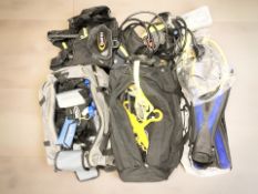 A large quantity of scuba diving equipment.