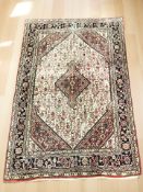 A Kashgai rug, 165 cm x 112 cm.