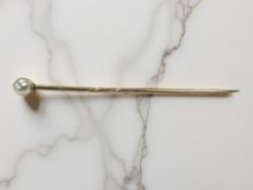 A gold and seed pearl stick pin CONDITION REPORT: 1g