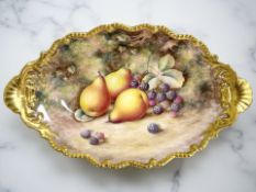 A Royal Worcester oval twin-handled porcelain dish, hand-painted with fruit by Harry Ayrton,