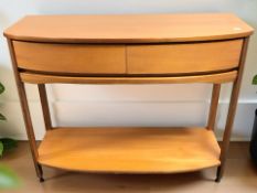 A Nathan Shades teak bow front side table fitted two drawers, 104 cm x 40 cm x 80 cm.