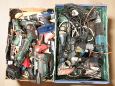 A collection of power tools and hand tools including Parkside, Black & Decker, etc.