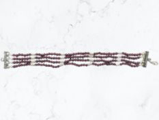 A Kit Heath silver and faux ruby bracelet, length 16cm.