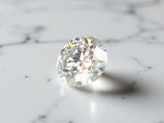 A loose brilliant cut moissanite, 3ct, with GRA grading report.