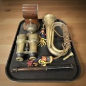 A brass bugle, a pair of binoculars, a desk bell, a rosewood flute, etc.