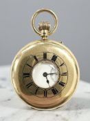 A good 18ct yellow gold half-hunter pocket watch, the case front with enamelled Roman chapter ring,
