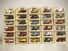 A collection of boxed Days Gone die cast delivery vans.