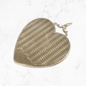 An early 20th century 9ct gold back/front heart shaped locket pendant, width 40 mm.