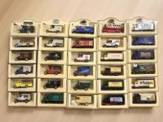 A collection of boxed Lledo die cast delivery vehicles.