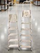 Two aluminium stepladders.