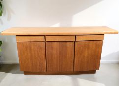 A Danish Gangsø Møbler teak bow front sideboard, fitted three drawers and cupboards beneath,