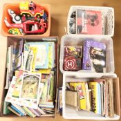 A large quantity of vintage and modern children's annuals and books, toys, puzzles, etc.