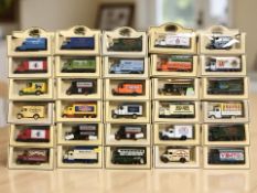 A collection of boxed Lledo die cast delivery vehicles.