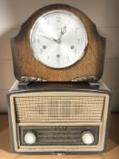 A Bush bakelite valve radio and a Smiths Art Deco mantel clock.