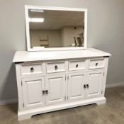 A modern painted pine sideboard, fitted cupboards and drawers beneath, 130 cm x 50 cm x 81 cm,