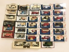 A collection of boxed Days Gone die cast delivery vans.