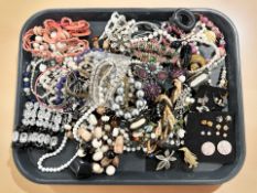A collection of costume bead necklaces, simulated pearls, earrings,