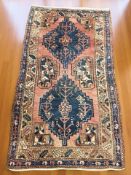 A Hamadan rug, North West Iran, 196 cm x 109 cm.