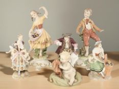 A pair of Capodimonte figures of a boy and girl,