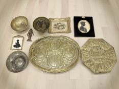 A group of eastern brass wares including bowls, oval tray, a temple deity figure,
