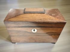 A Regency rosewood sarcophagus tea caddy, width 20 cm.