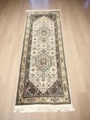 An Iranian geometric runner, 217 cm x 80 cm.