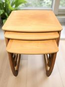 A Nathan teak nest of three tables, width 53 cm.