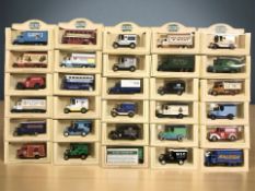 A collection of boxed Lledo die cast delivery vehicles.
