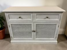 A modern side cabinet with caned cupboard doors beneath, 100 cm x 35 cm x 74 cm.