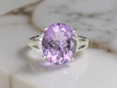 A silver dress ring with set natural amethyst, 4.5ct, size N/P, with AIG certificate.