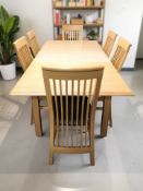 A modern oak extending dining table, with leaf, overall 195 cm x 95 cm x 75 cm,