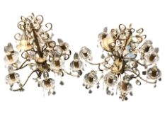 A pair of gilt metal chandeliers with glass bowls and droplets, diameter 60 cm.