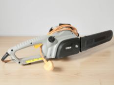 A Titan electric chainsaw.