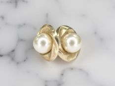 A pair of 9ct gold cultured pearl ear studs CONDITION REPORT: 0.