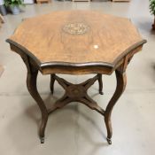 A late Victorian rosewood and satinwood inlaid octagonal occasional table, diameter 73 cm.