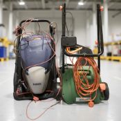 A Hawksmoor electric lawnmower and a Spear & Jackson mower.