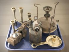 A brass Primus stove, together with a chamber stick, blow torch, candle stand, etc.