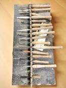 A collection of woodworking chisels.